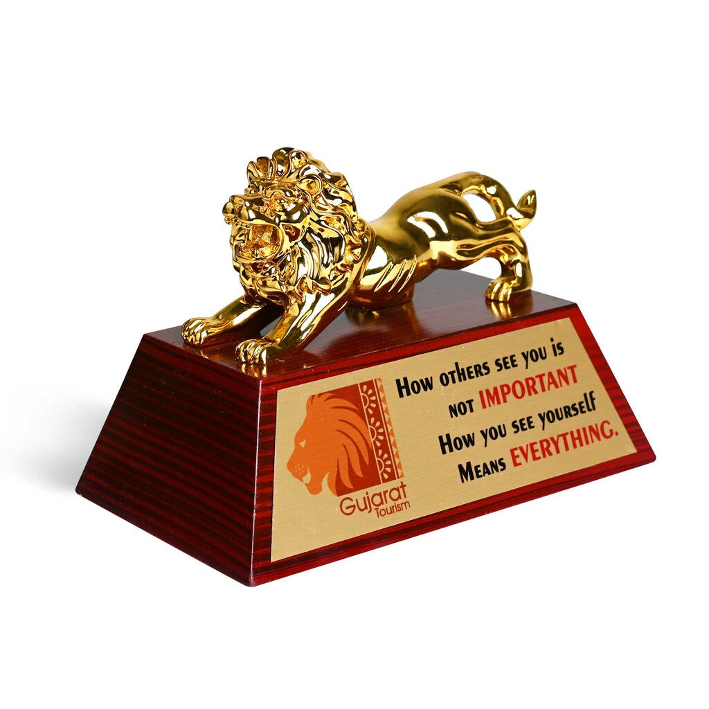 A Majestic Gold Lion On A Rich Wooden Base